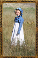 Komplet dziewczęcy - sukienka z drukowanej bawełny, lniany spencer i kapelusz.